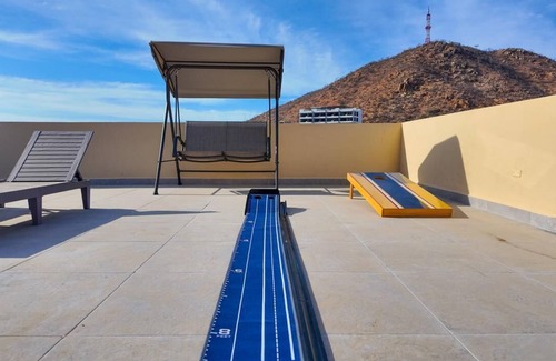 Libertad Condo | 2BD, 2BA Luxury Penthouse with Private Rooftop in Cabo. LOTS OF BEACH GEARS!