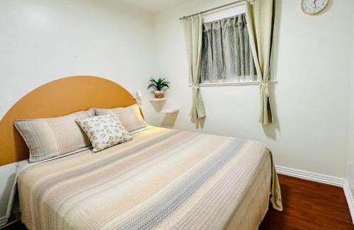 Renfrew-Collingwood House | 2BR 1BA Guest Suite with King Bed - Free Parking - Renfrew Station - Central Location