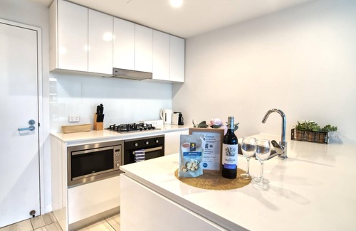 Newstead Apartment | 2BR Food Drink Hub Gym Pool Views Roof Terrace