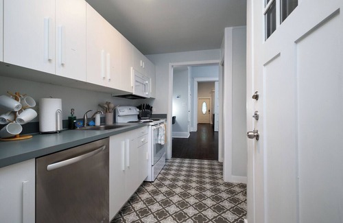 Southtown Condo | 2BR Riverwalk Condo Corporate & Insurance Stays Fast Wi-Fi W/D Monthly