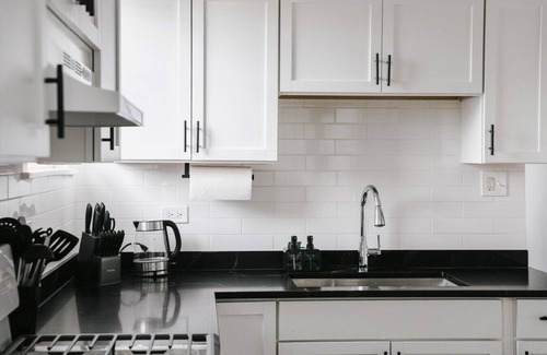 Cragin Apartment | 2BR Sleeps 7 Coffee Station Backyard w/Grill