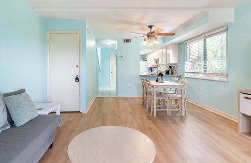 Indian Harbour Beach Condo | 2BR Stylish Retreat with BBQ, Pool & Beach