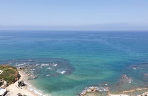 Netanya House | 2BR Suite steps from the beach