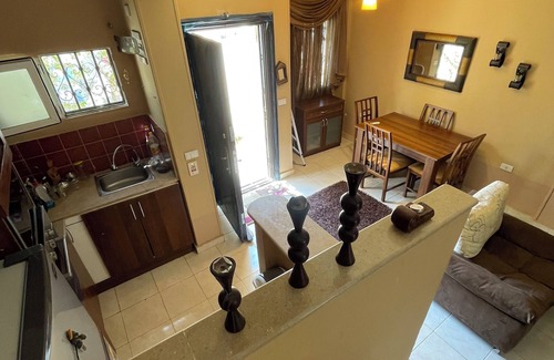 Sheikh Zayed City Ski Chalet | 2BR Townhouse with Backyard
