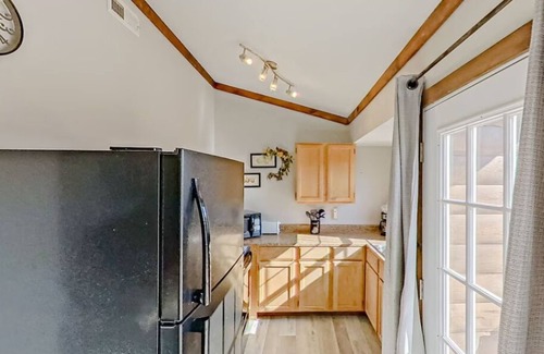 Indian Point Condo | 2BR Waterfront Duplex Cabin w/Pool + Swim & Boat dock