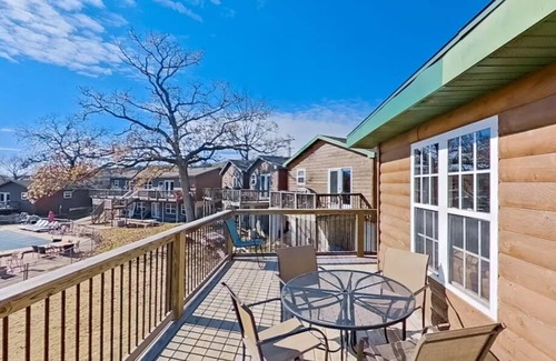 Indian Point Condo | 2BR Waterfront Duplex Cabin w/Pool + Swim & Boat dock
