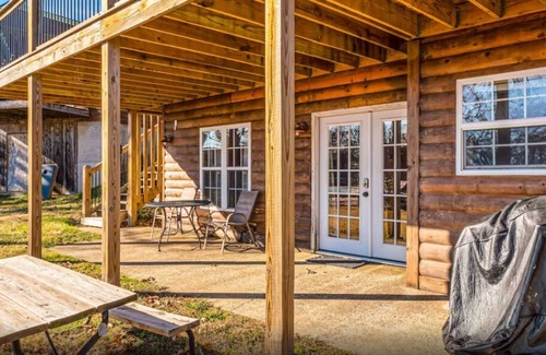 Indian Point Condo | 2BR Waterfront Duplex Cabin w/Pool + Swim & Boat dock