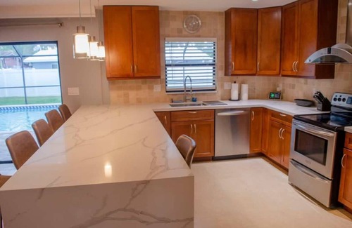 Coral Heights House | 3/2 home, Saltwater Heated Pool/5-min to bch/Pet