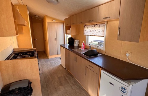 Towyn Ski Chalet | 3 Bed Caravan - Side gated decking, WiFi, Pets