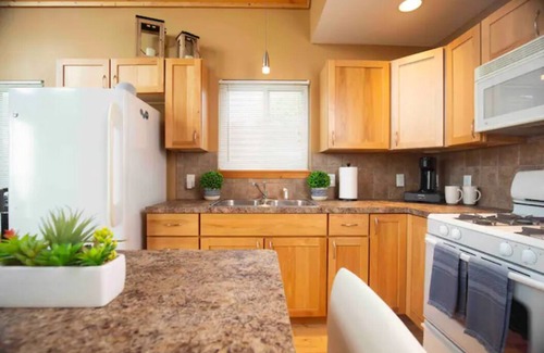 Houghton Lake House | 3-Bed Modern Cabin with Over 40 Ft of Waterfront, Private Dock, and Boat Lift