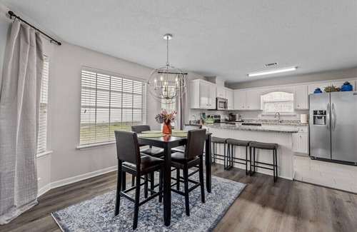 National Hills House | 3 bedroom, 2.5 bathroom patio home with an inground pool. The sleeping arrangements at this property include three queen beds and a futon located in the second living room.