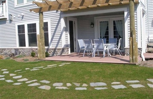 Ludington Condo | 3 Bedroom, 2 Bath Ground Level Condo with Walkout Access to Pool & Courtyard!