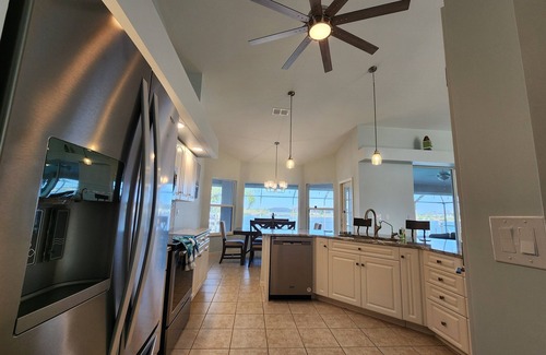 Burnt Store House | 3-bedroom Gulf access heated pool lanai tiki dock