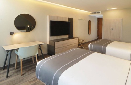 Providencia Hotel | 3 Boutique-Style Rooms in Trendy Providencia – Walk to Dining & Green Spaces