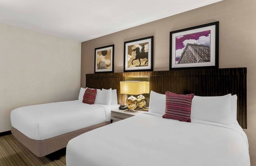 Downtown Baltimore Hotel | 3 Relaxing Rooms with Fitness Center | Close to MT Bank Stadium