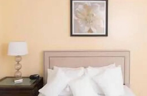 Cotton Ground House | 3 Spaces Beachfront Accommodation! Comes w/ FREE Parking, Outdoor Pools!