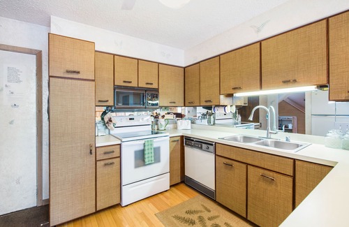 Harbor Springs Condo | 3-story dog-friendly condo w/free WiFi, balcony, shared heated pool, fireplace