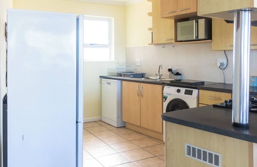 Jeffreys Bay Apartment | 350 metre from beach. 2-bedroom, 2-bathroom ground floor apt with patio & braai