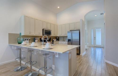 Kissimmee Villa | #372-Welcome to Lightwater Villa, your Modern Disney Vacation home! South-Facing Pool & Spa Overlooking Lake