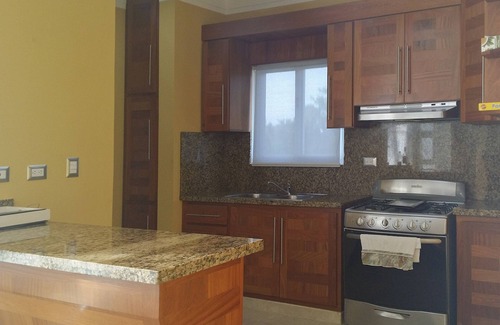 La Esplanada Apartment | 3BD central condo in Sosua, fully equipped, large pool, WIFI BBQ A/C Cable TV