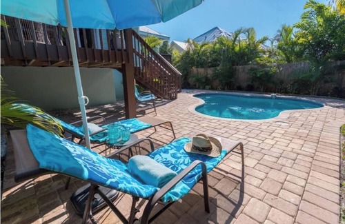 Holmes Beach House | 3BR Beach Home heated Pool, Decks & BBQ