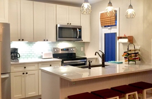 Maple City Condo | 3BR Beachfront Homestead Condo. Great Beach. Amazing Sunsets. Directly on Lake