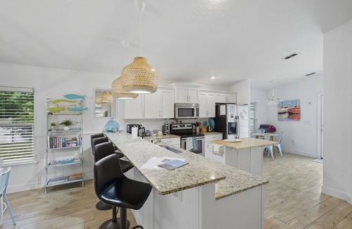 Palm Coast House | 3BR Coastal Home + Heated Pool, Golf Cart & Bikes