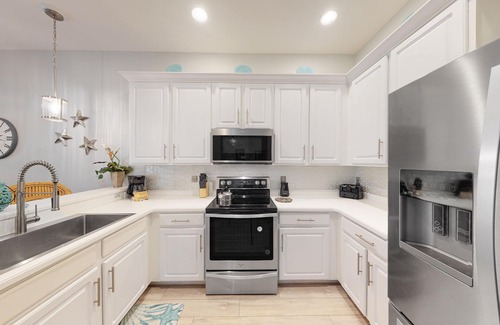 Bahama Bay Condo | 3rd floor condo w/restaurant, balcony, near theme parks, sauna, shared pools