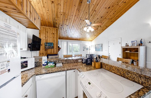 Ocean Ridge House | 3rd-floor, dog-friendly condo with loft, balcony, free WiFi and golf course view