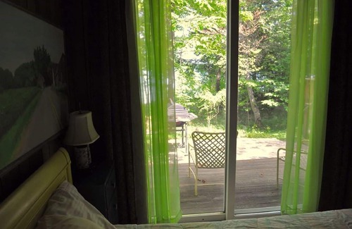 Traverse City House | 4 Bdrm Beach Front Home on Traverse Bay! Summer 2025 Openings!