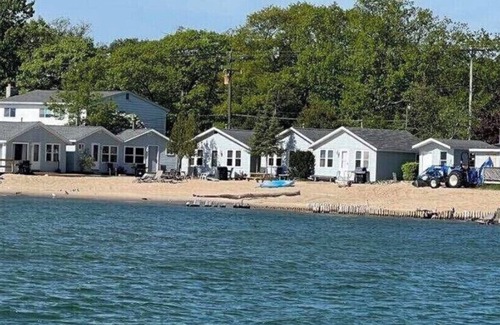 Au Sable Charter Township Cabin | #4 Beach front Cabin at Miami Beach Resort