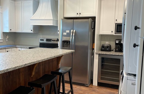 Ocean Isle Beach Cottage | 4 Bed 3.5 Bath Pool Mid Island, Quiet Garden lined Street, steps from the Beach!