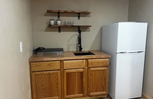 Sturgis Cabin | 4-bedroom, 2-bathroom log cabin offers the perfect retreat close to downtown Sturgis. With breathtaking views and a peaceful wooded setting, this cozy home-away-from-home is perfect for families or groups, comfortably accommodating up to 8 guests.