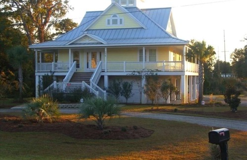 North Litchfield Beach House | 4 Bedroom, 4 Bath Raised Beach House 3 Blocks From the Beach! Golf Cart Included