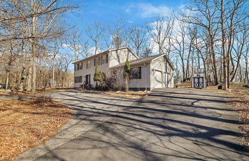 Bushkill House | 4-bedroom house in charming Saw Creek Poconos area with pool access, plus more!