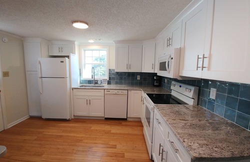 Pine Knoll Shores Cottage | 4 bedroom retreat just two blocks from ocean access. Pet-friendly!