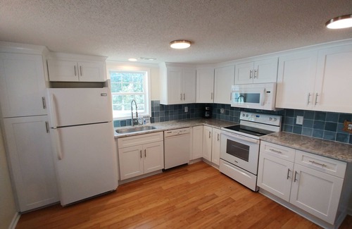 Pine Knoll Shores Cottage | 4 bedroom retreat just two blocks from ocean access. Pet-friendly!