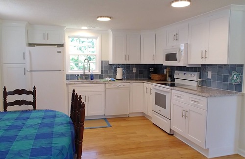 Pine Knoll Shores Cottage | 4 bedroom retreat just two blocks from ocean access. Pet-friendly!