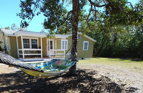 Pine Knoll Shores Cottage | 4 bedroom retreat just two blocks from ocean access. Pet-friendly!