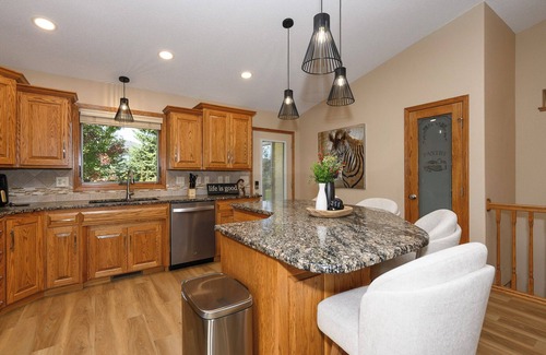 Bismarck House | 4-bedroom townhome in a quiet, upscale neighborhood with a private deck and yard