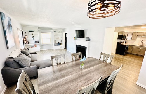 Sioux Falls House | 4-bedroom vacation home: Sleeps 13. Foosball, 65" TV, Golf, 4 Season Room
