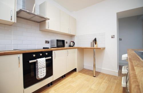 Landore Apartment | 4 Bedrooms, Street Parking, Convenient Location