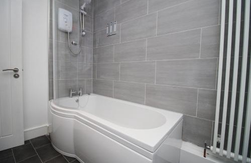 Landore Apartment | 4 Bedrooms, Street Parking, Convenient Location