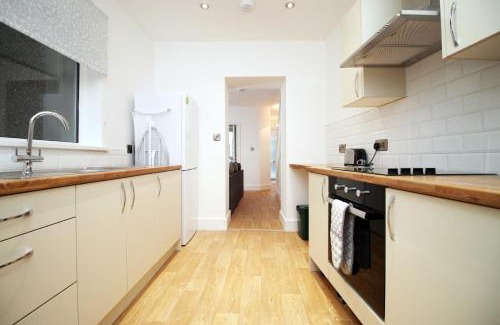 Landore Apartment | 4 Bedrooms, Street Parking, Convenient Location