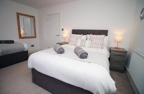 Landore Apartment | 4 Bedrooms, Street Parking, Convenient Location
