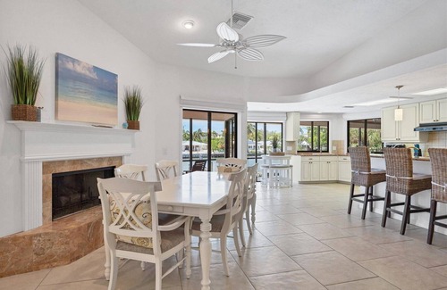 Saint Armands Key House | 4 BR/3 BA Lido Canal Home by FVC