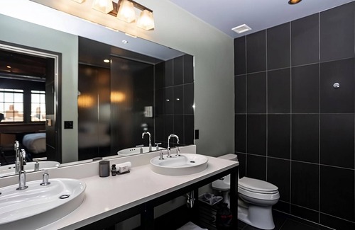 Fifth Ward Hotel | 4 Custom Deluxe 2 Queen Beds at The Iron Horse Hotel, Bring Along Your Pets!