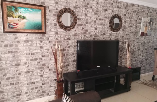 Illovo Beach Apartment | 40 La Mer, in front of Illovo beach