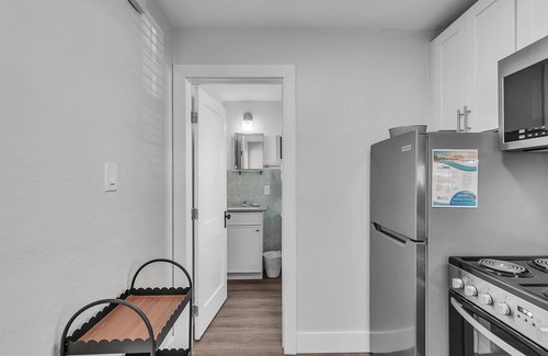 Treasure Island Apartment | 🌞400 ft to the Beach👙Onsite Heated Pool🐬Bungalows #2🌴Grills🐶Dogs Welcome!