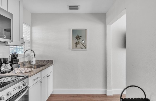 Treasure Island Apartment | 🌞400 ft to the Beach👙Onsite Heated Pool🐬Bungalows #2🌴Grills🐶Dogs Welcome!